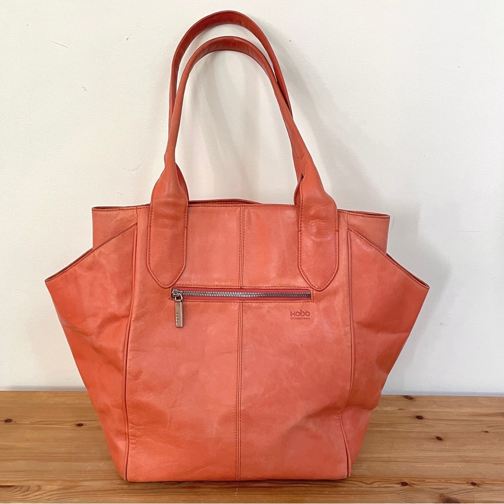 Hobo International large leather tote in salmon color.